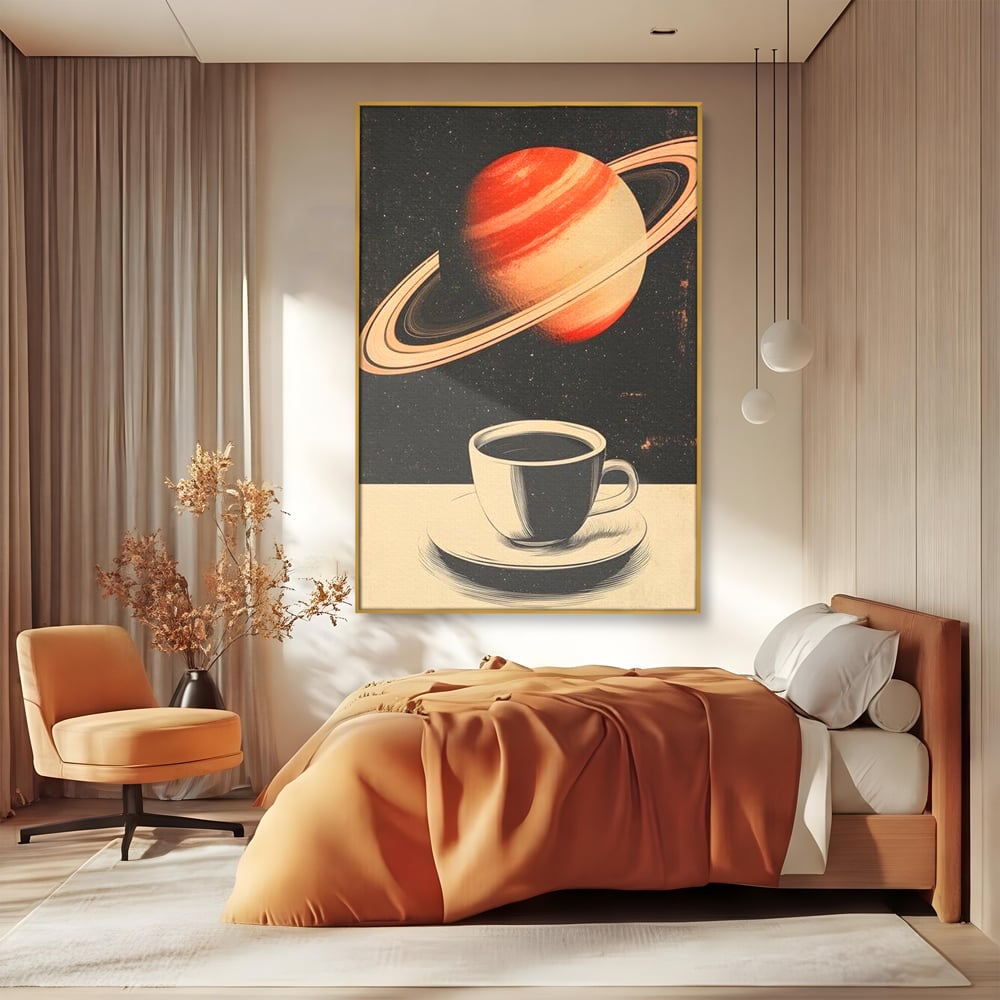 Tablou canvas cu ilustratie cu ceasca de cafea si planeta saturn, in rama de aluminiu auriu, pe perete intr-un dormitor